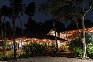 Night view of portico by manjal - a restaurant designed by one of the top architects in kochi